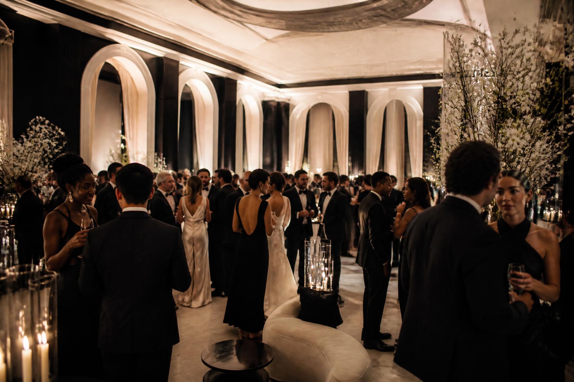 Elegant luxury ballroom filled with guests at a refined celebration