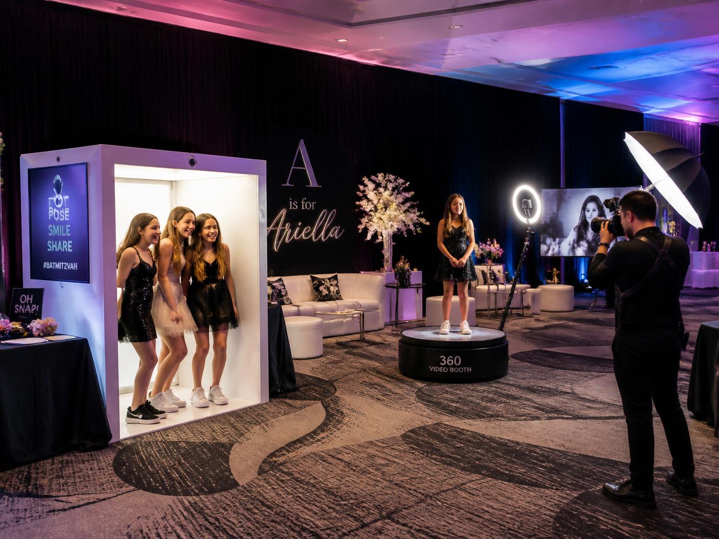 Guests enjoying an elegant photo booth activation at a luxury event